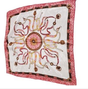 Red and White Scarf with Sun Motif and Flowing Patterns